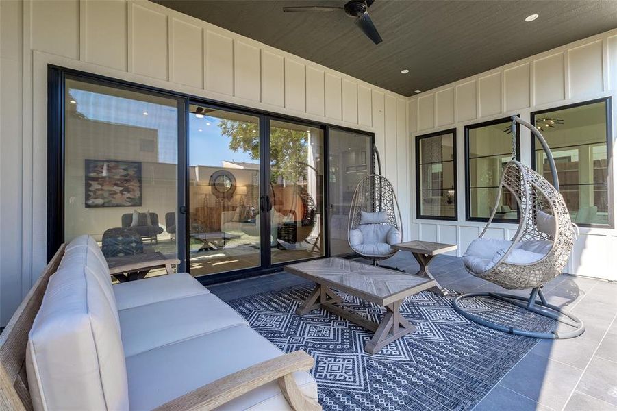 View of patio featuring ceiling fan