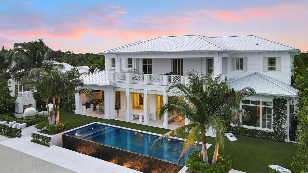 Front exterior of a new home in , North Palm Beach, FL, highlighting curb appeal (Image 22). Front exterior of a new home in , North Palm Beach, FL, highlighting curb appeal (Image 22).