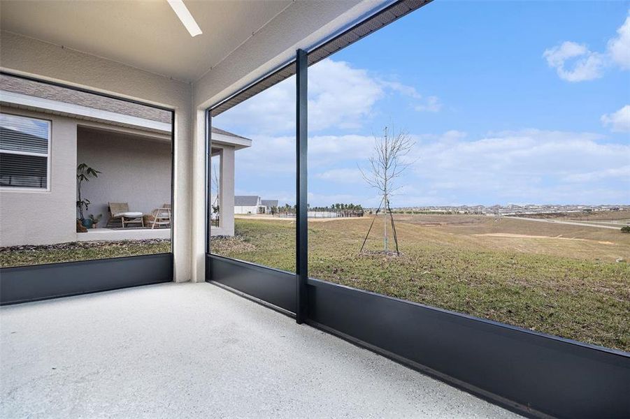 Exterior details and patio area of a home in Hills of Minneola, Minneola (Image 25).