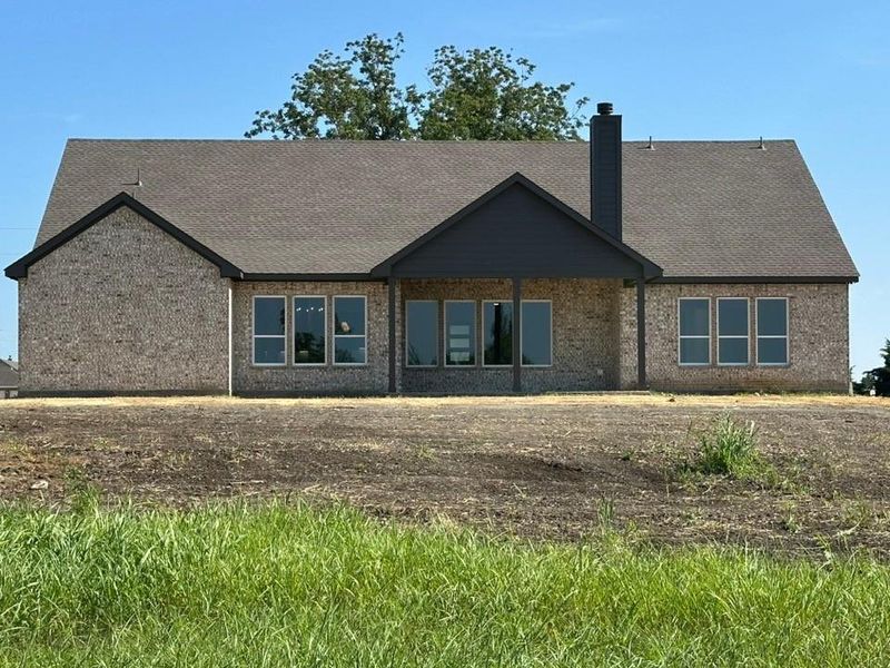 Exterior details and patio area of a home in Fannin Ranch, Leonard (Image 3).