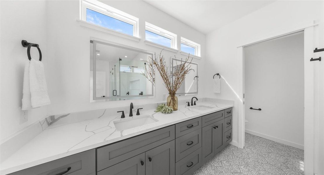 A double vanity offers room to spread out, turning the morning routine into something calmer. Model No. 105 Shown.