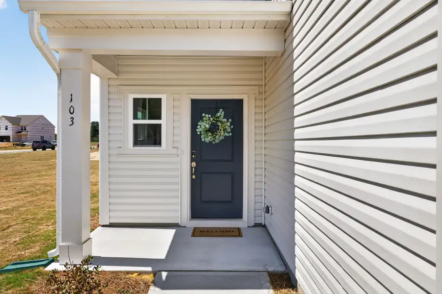 Exterior details and patio area of a home in Nathans Ridge, Lillington (Image 2).