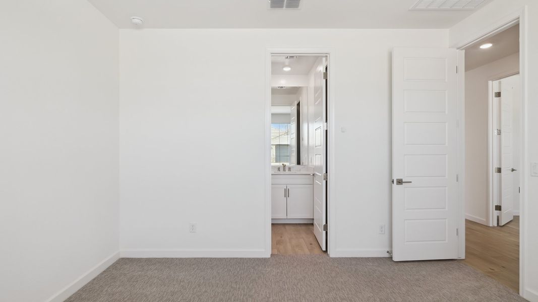 Spacious, unfurnished interior of a new home in Zanjero Pass, Waddell (Image 24).