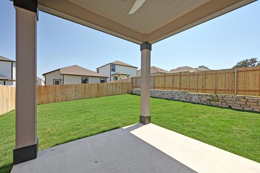 Exterior details and patio area of a home in Creekside at Estancia, Austin (Image 3).