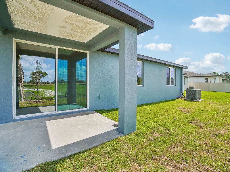 Exterior details and patio area of a home in Pine Ridge Meadows, Hudson (Image 3).