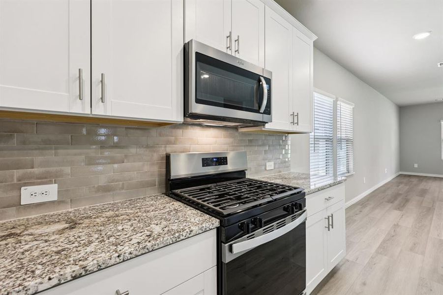 Furnished interior view inside a new home in Westmoor, Sherman (Image 13).