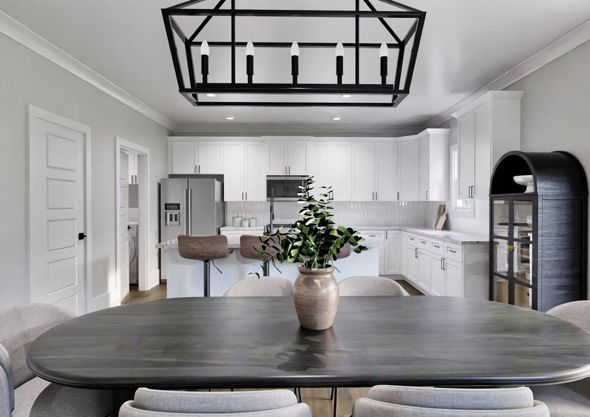 A dining room featuring an elegant black and white chandelier hanging from the ceiling.
