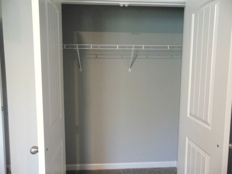 The third bedroom with large windows for that nature lighting, as well as your closet with
a convenient rack. The third bedroom with large windows for that nature lighting, as well as your closet with
a convenient rack.