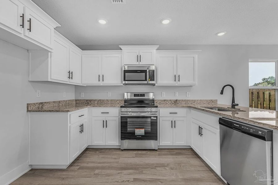 Furnished interior view inside a new home in Allison Acres, Cantonment (Image 8).