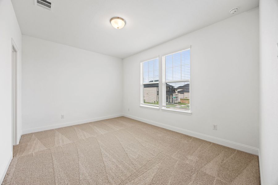 Representative unfurnished interior of a home built from the Kelly by Cambridge Homes in Lake Park, Rowlett (Image 17).