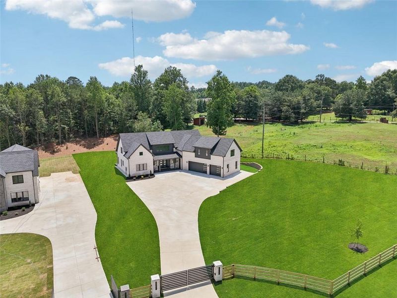 Front exterior of a new home in , Braselton, GA, highlighting curb appeal (Image 31). Front exterior of a new home in , Braselton, GA, highlighting curb appeal (Image 31).
