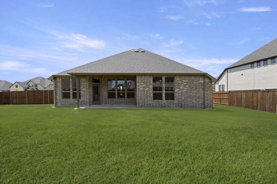 Exterior details and patio area of a home in Lovers Landing, Forney (Image 4).