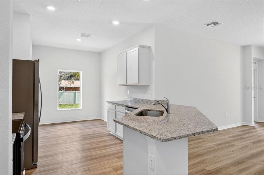 Furnished interior view inside a new home in , Deltona (Image 9).
