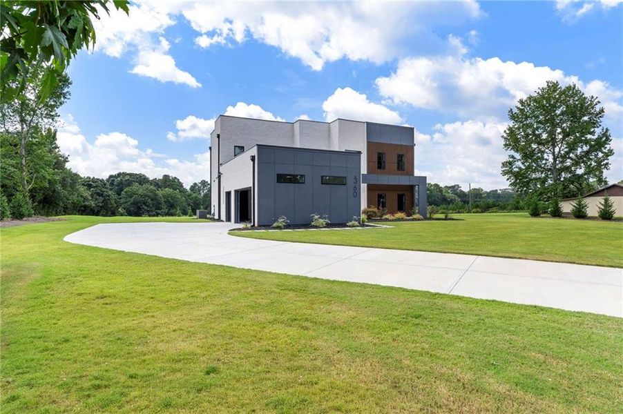 Front exterior of a new home in , McDonough, GA, highlighting curb appeal (Image 30).