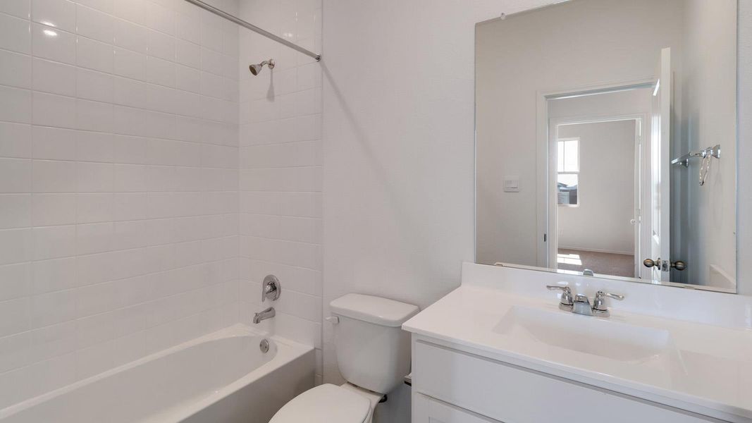 Furnished interior view inside a new home in Marigold, Kyle (Image 6).