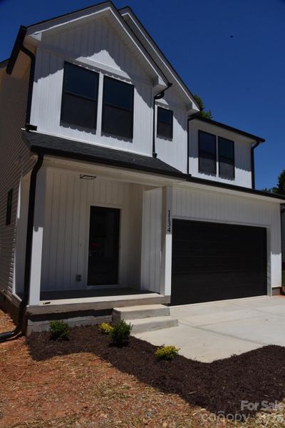 Front exterior of a new home in , Lincolnton, NC, highlighting curb appeal (Image 20).