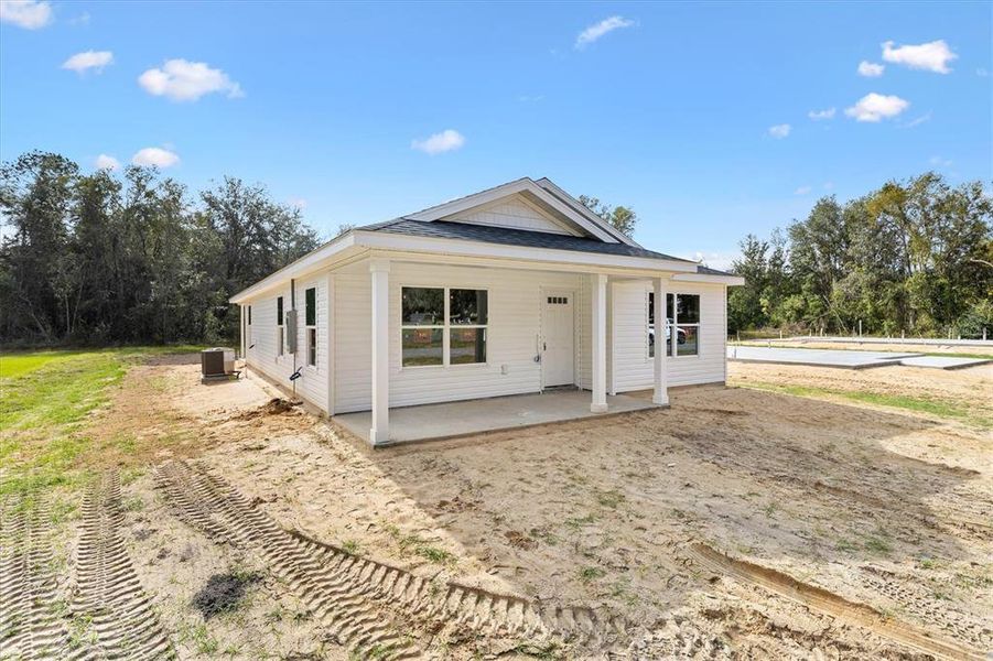 Exterior details and patio area of a home in , Bushnell (Image 24).