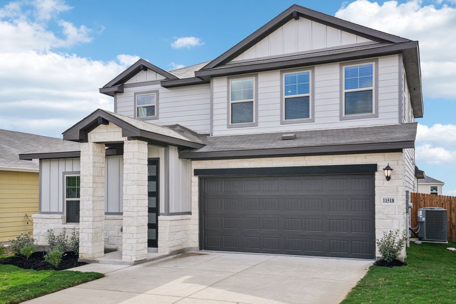 Front exterior of the Reynolds floorplan at a Meritage Homes community.