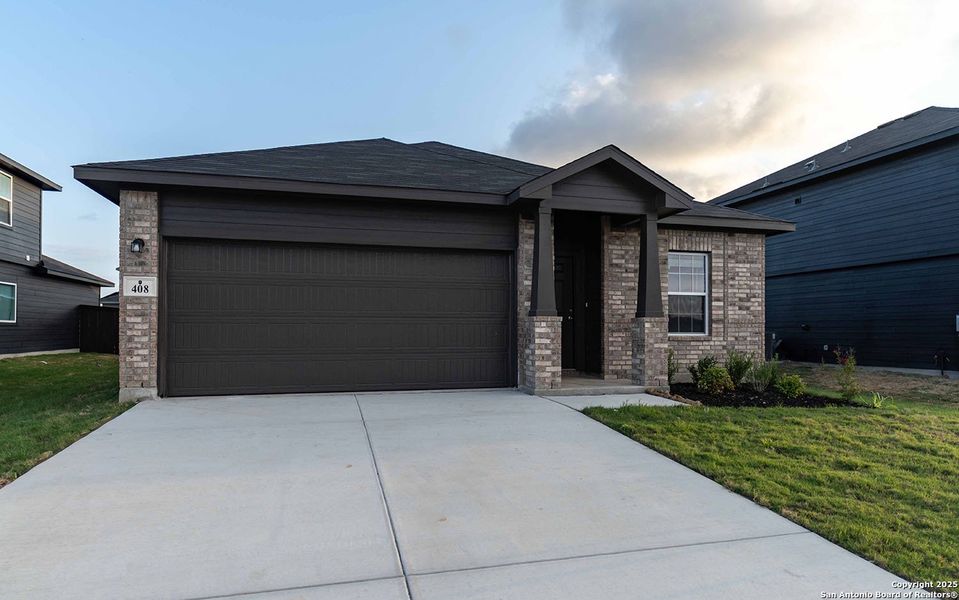 Front exterior of a new home in Hannah Heights, Seguin, TX, highlighting curb appeal (Image 1). Front exterior of a new home in Hannah Heights, Seguin, TX, highlighting curb appeal (Image 1).