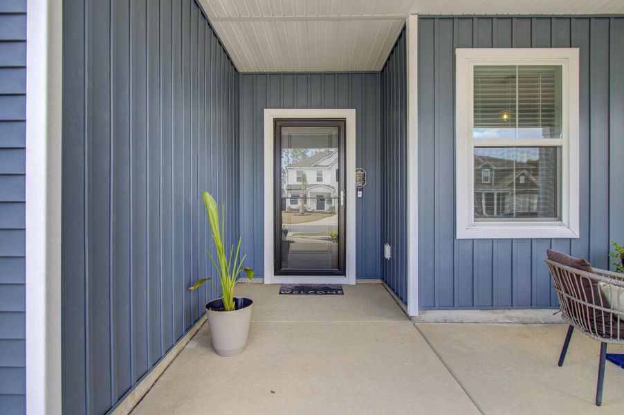 Exterior details and patio area of a home in Sanctuary Cove at Cane Bay, Summerville (Image 28).