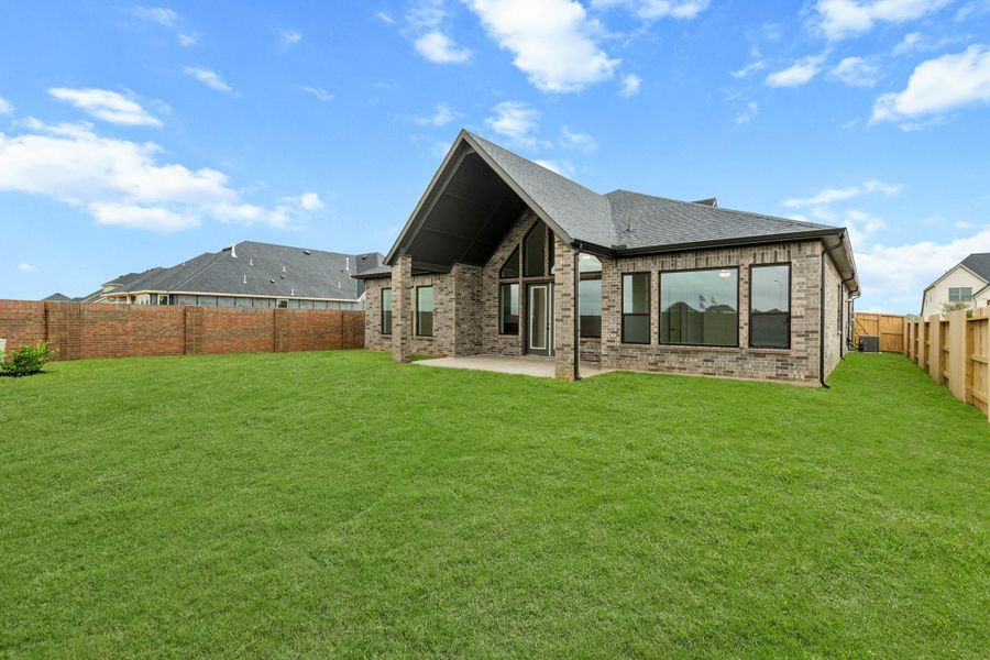Exterior details and patio area of a home in Legacy Prairie at Katy Court 65' & 70', Katy (Image 2). Exterior details and patio area of a home in Legacy Prairie at Katy Court 65' & 70', Katy (Image 2).