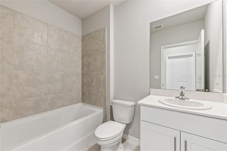 Furnished interior view inside a new home in Heritage Lake Park, Punta Gorda (Image 5).