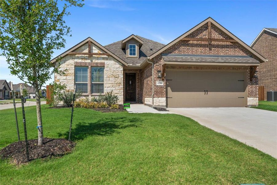 Front exterior of a new home in Aero Vista, Caddo Mills, TX, highlighting curb appeal (Image 25). Front exterior of a new home in Aero Vista, Caddo Mills, TX, highlighting curb appeal (Image 25).