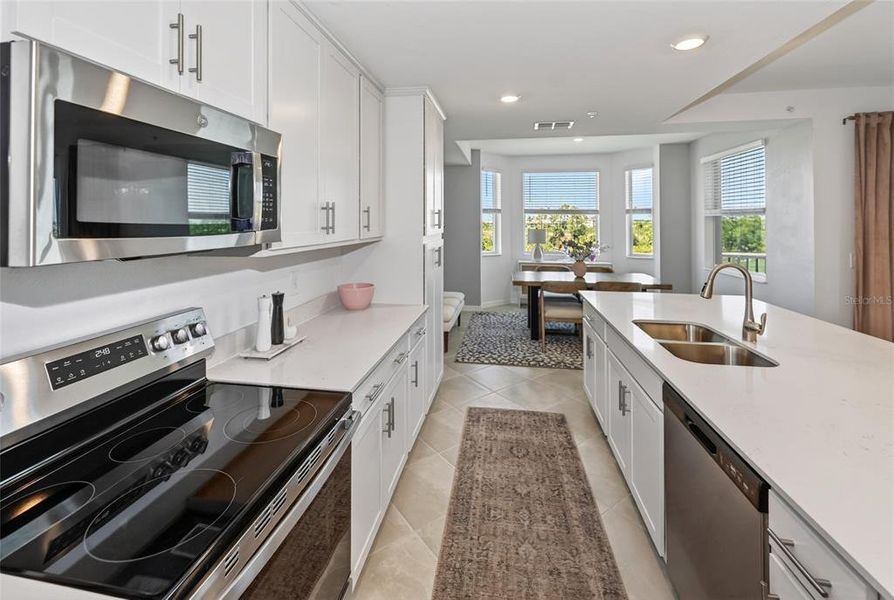 Furnished interior view inside a new home in Wellen Park Golf & Country Club, Venice (Image 17).