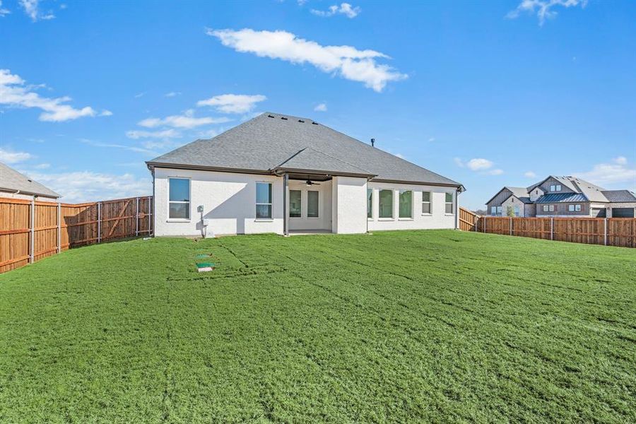 Exterior details and patio area of a home in Settlers Glen, New Fairview (Image 25).