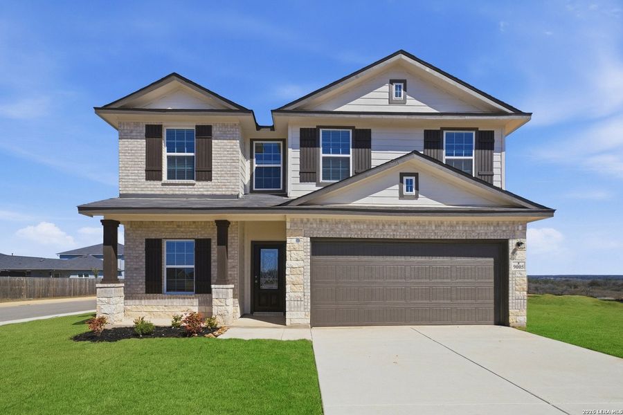 Front exterior of a new home in Hickory Ridge, Elmendorf, TX, highlighting curb appeal (Image 16).