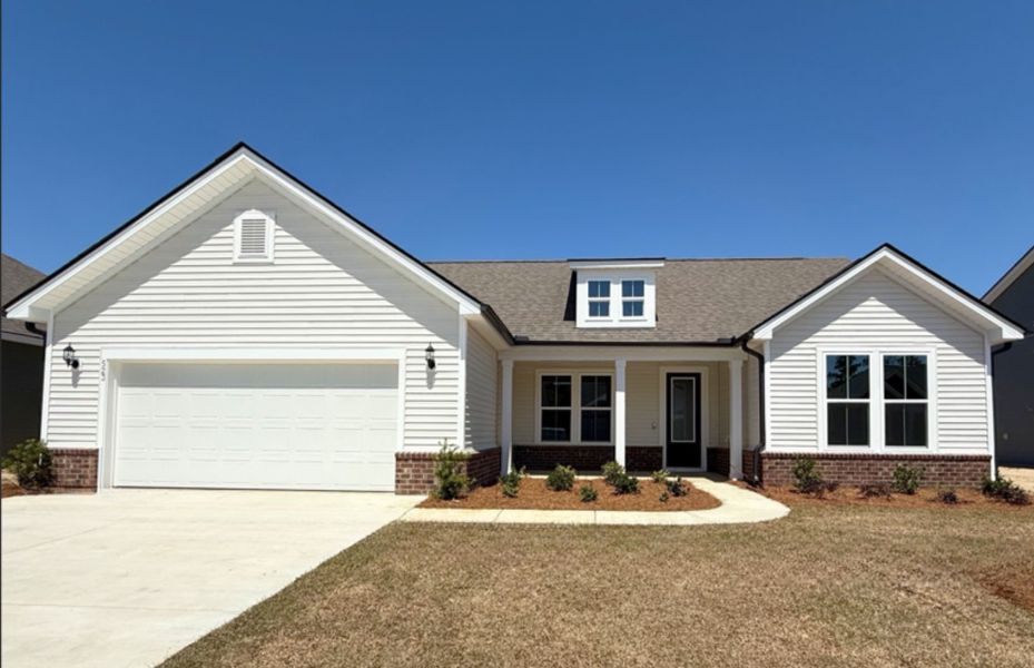 Front exterior of a new home in Crescent Cove, Myrtle Beach, SC, highlighting curb appeal (Image 16).