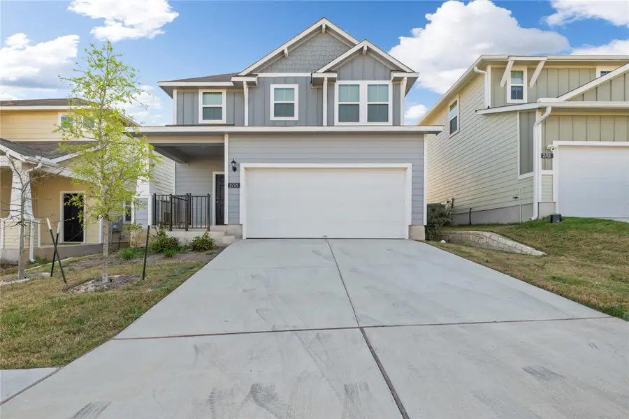 Front exterior of a new home in Edgebrooke, Pflugerville, TX, highlighting curb appeal (Image 1). Front exterior of a new home in Edgebrooke, Pflugerville, TX, highlighting curb appeal (Image 1).