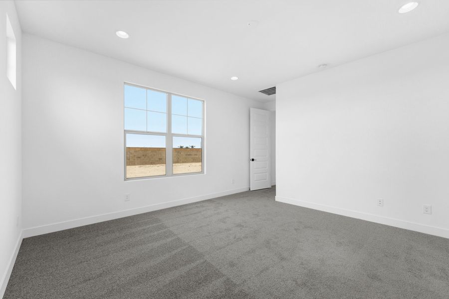 Spacious, unfurnished interior of a new home in Combs Ranch, San Tan Valley (Image 24).