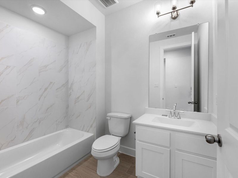 Furnished interior view inside a new home in Sienna, Missouri City (Image 9).