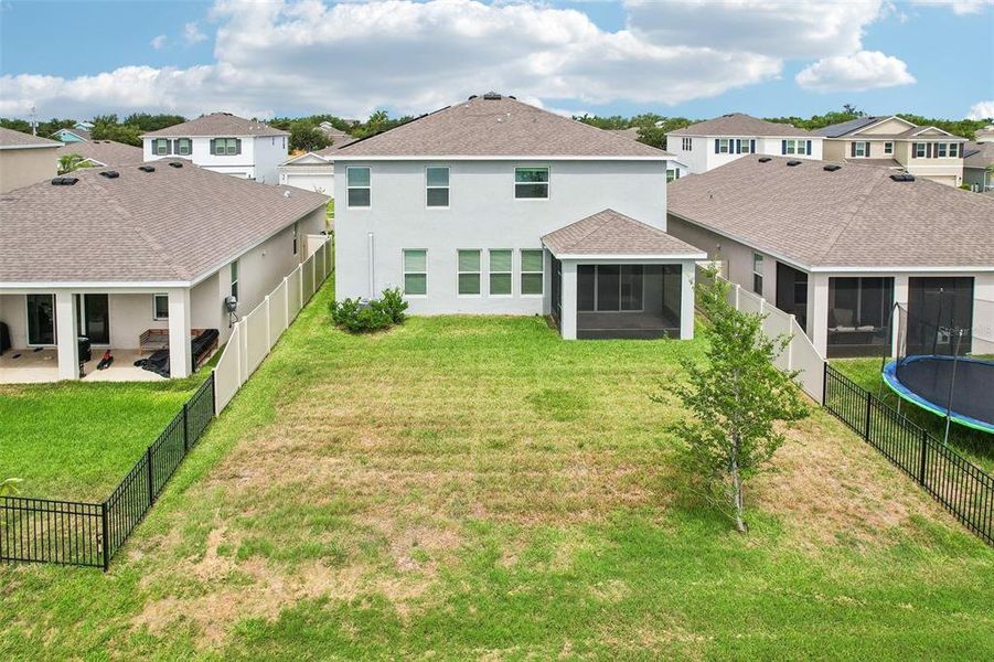 Exterior details and patio area of a home in Mangrove Manor, Apollo Beach (Image 19).