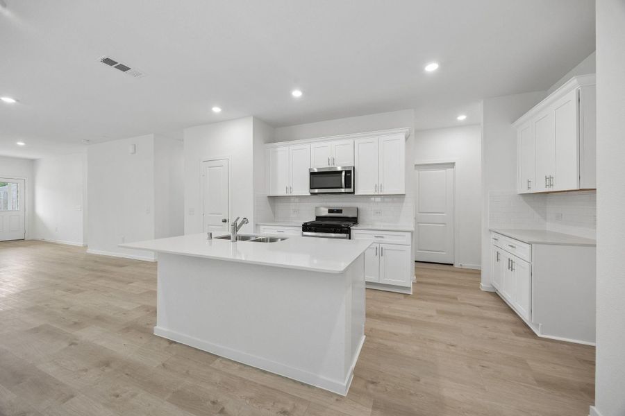 Furnished interior view inside a new home in Mavera, Conroe (Image 9).