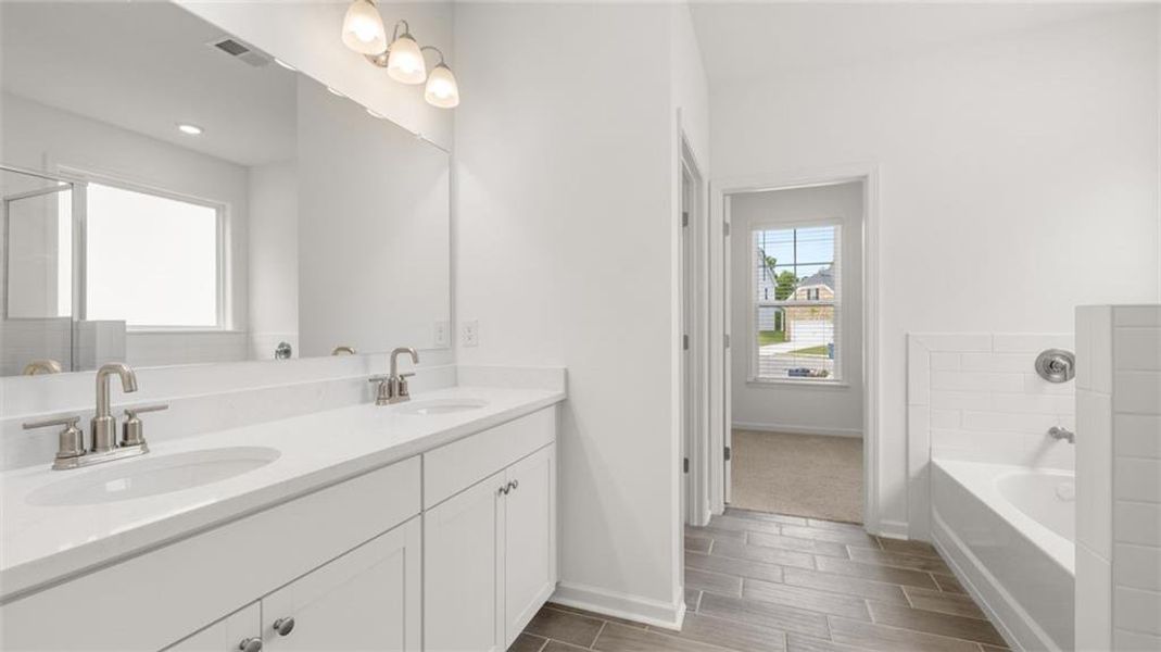 Furnished interior view inside a new home in Heritage Pointe, Senoia (Image 1).