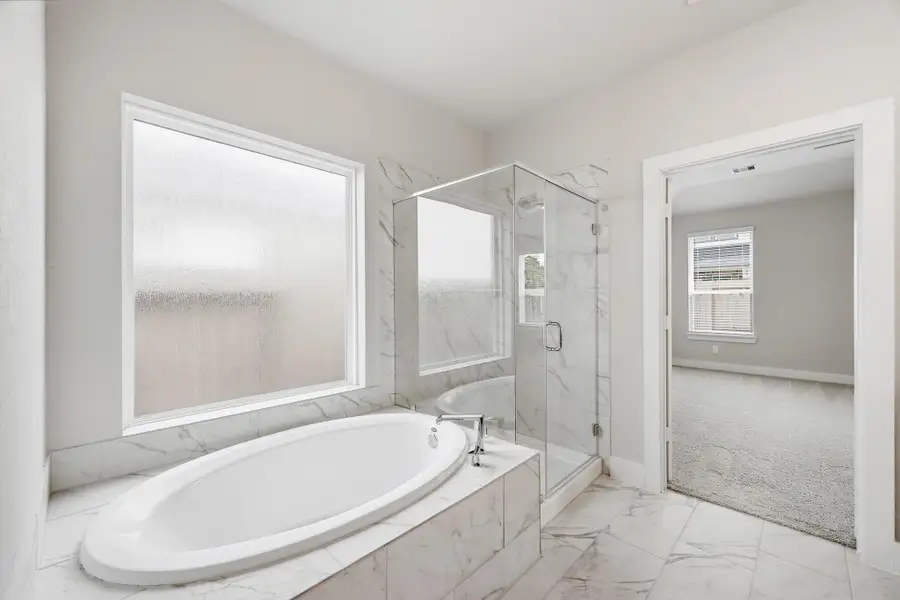 Furnished interior view inside a new home in Barton Creek Ranch, Conroe (Image 13).