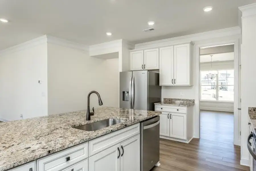 Furnished interior view inside a new home in Daniel Farms, Benson (Image 10).