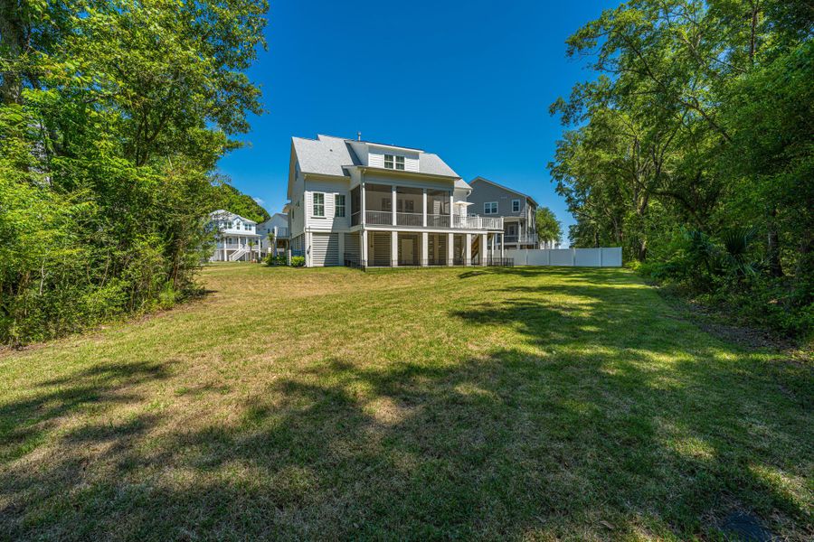 Exterior details and patio area of a home in Overlook at Copahee Sound, Awendaw (Image 26).