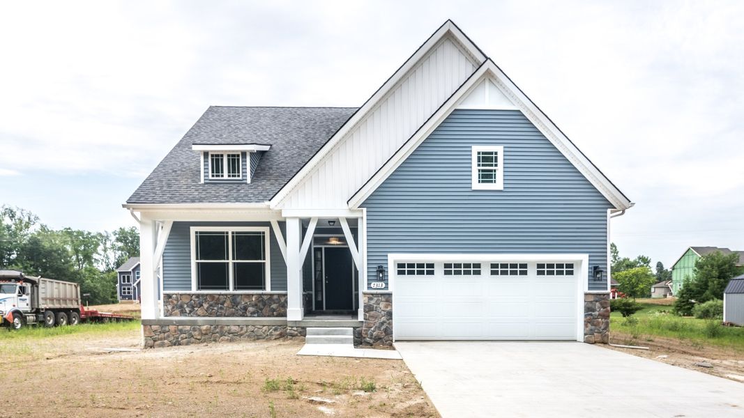 Representative exterior photo of a completed home built from the The Abington by Norfolk Homes in Valleys, Jackson, MI (Image 30).