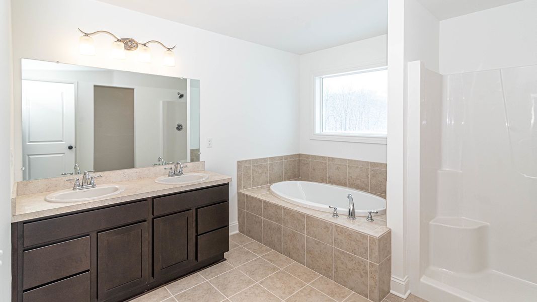 Representative furnished interior of a home built from the The Briarhaven III Side Entry by Norfolk Homes in Fosdick Glen of Saline, Saline (Image 18).