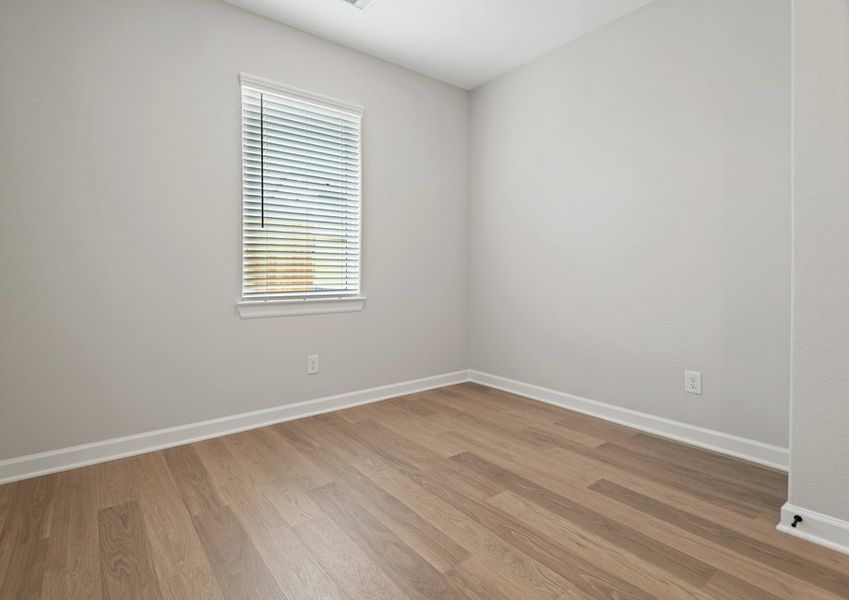 Dining room with a window facing the backayd. Dining room with a window facing the backayd.