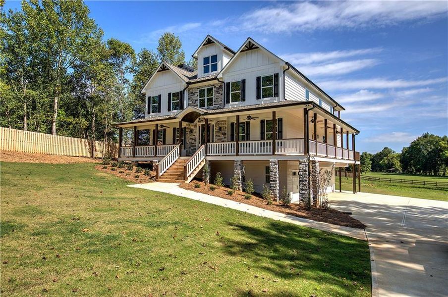 Front exterior of a new home in , Euharlee, GA, highlighting curb appeal (Image 24).