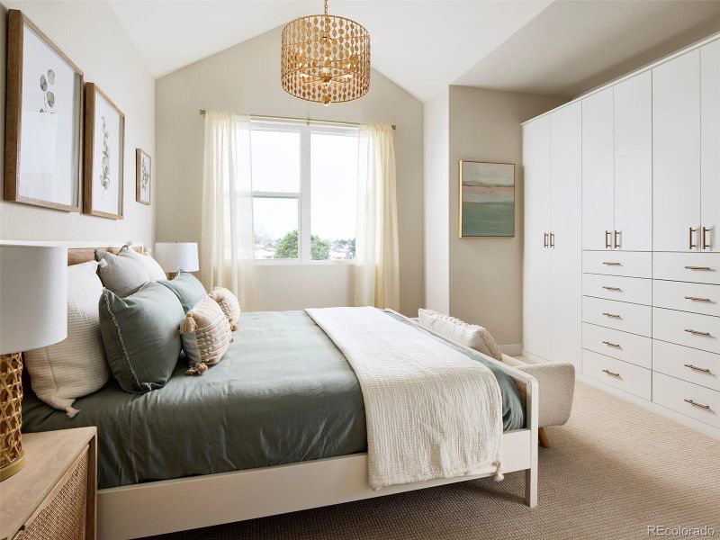 Primary suite with vaulted ceiling Primary suite with vaulted ceiling