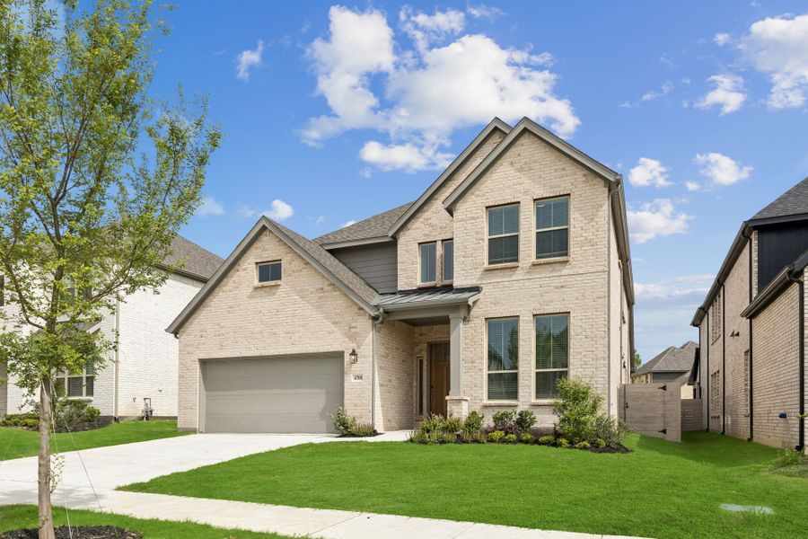Front exterior of a new home in Painted Tree Woodland West, McKinney, TX, highlighting curb appeal (Image 27).