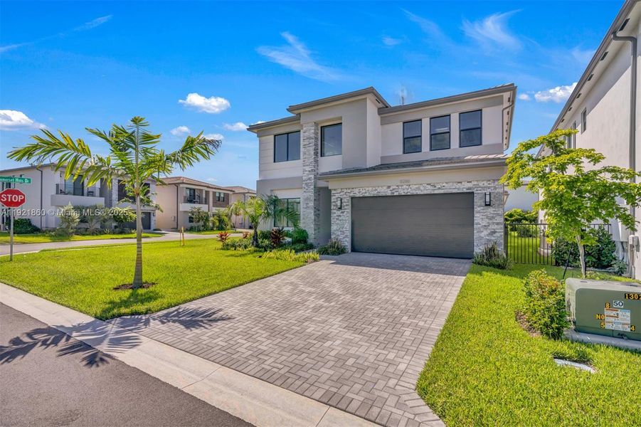 Front exterior of a new home in , Boca Raton, FL, highlighting curb appeal (Image 29). Front exterior of a new home in , Boca Raton, FL, highlighting curb appeal (Image 29).