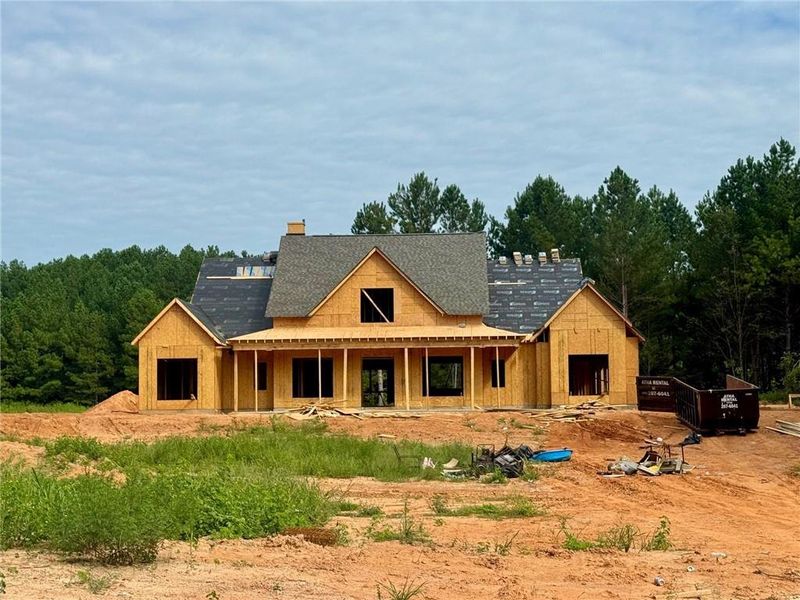 Front exterior of a new home in , Covington, GA, highlighting curb appeal (Image 4).