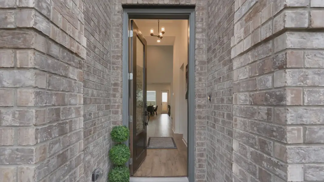 Exterior details and patio area of a home in The Grove at Blackhawk, Pflugerville (Image 3).
