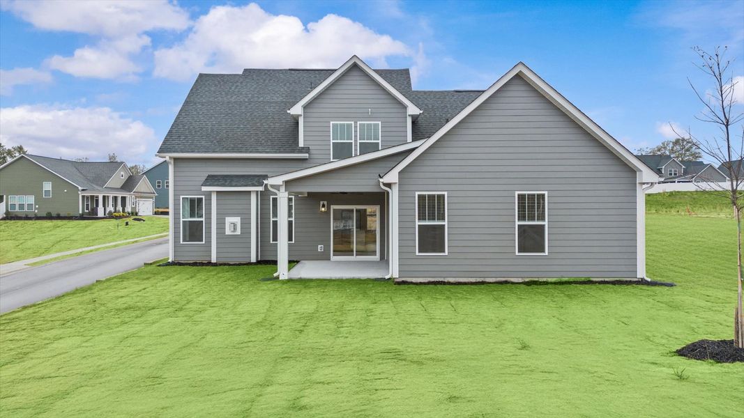 Highly functional rear covered porch adds memorable living space to this elegant home Highly functional rear covered porch adds memorable living space to this elegant home